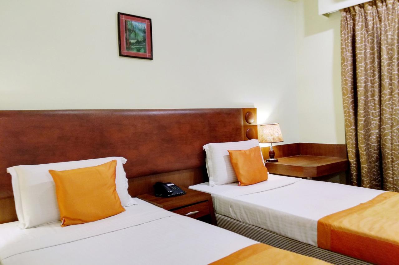 Oyo 6110 Thalassa Suites Bangalore Exterior foto